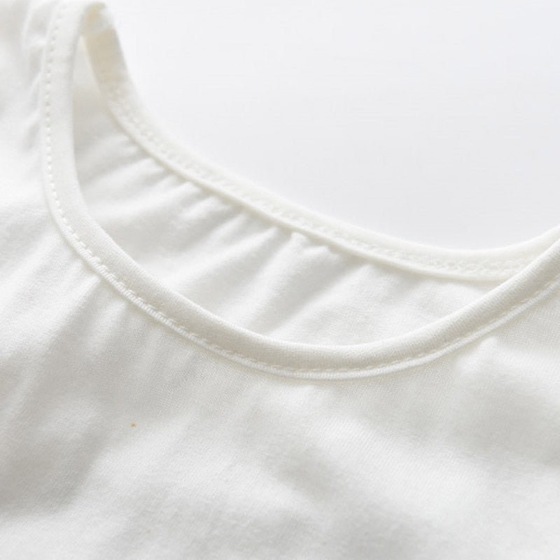 Détails col T-shirt blanc imprime licorne rose et bleu Kyoto