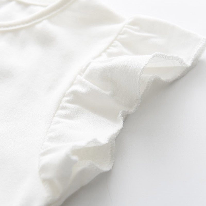 Détails manche T-shirt blanc imprime licorne rose et bleu Kyoto