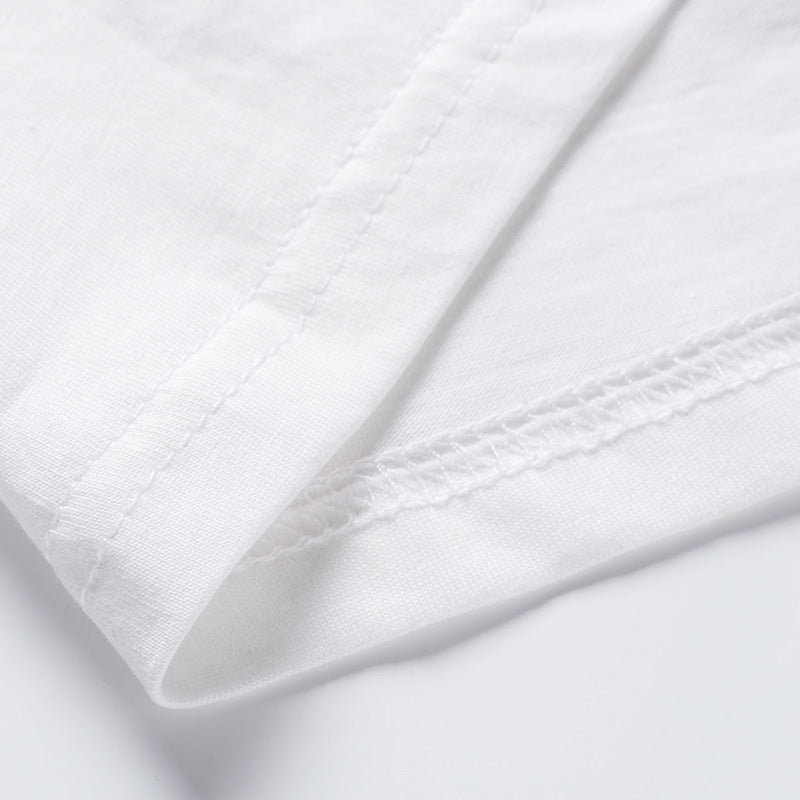 Zoom matière en coton du T-shirt blanc imprime licorne rose et bleu love